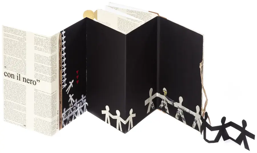 Io Sono, black concertina pages with a chain of cut paper figures